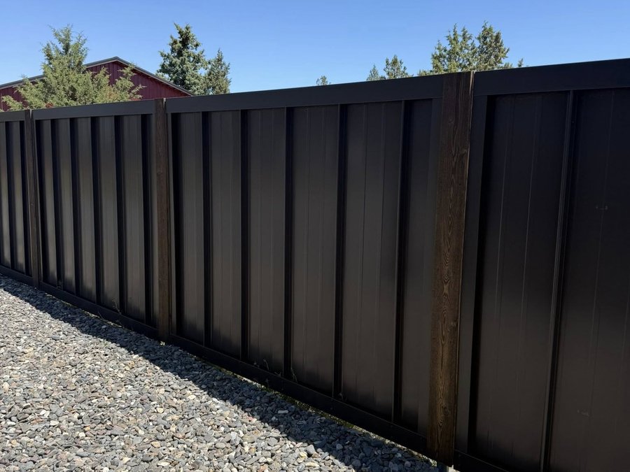 Finished black metal fence project
