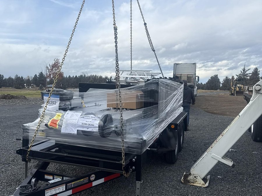 Caliber delivery trailer loaded with materials